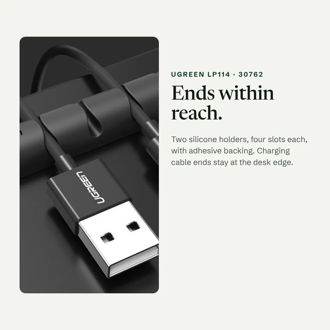 UGREEN LP114 silicone cable holder on a desk keeping a USB cable end within reach